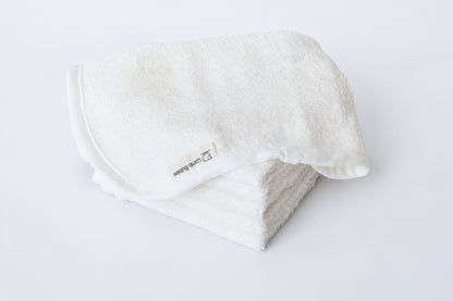Lamb Babies Baby Washcloths in White, folded stack