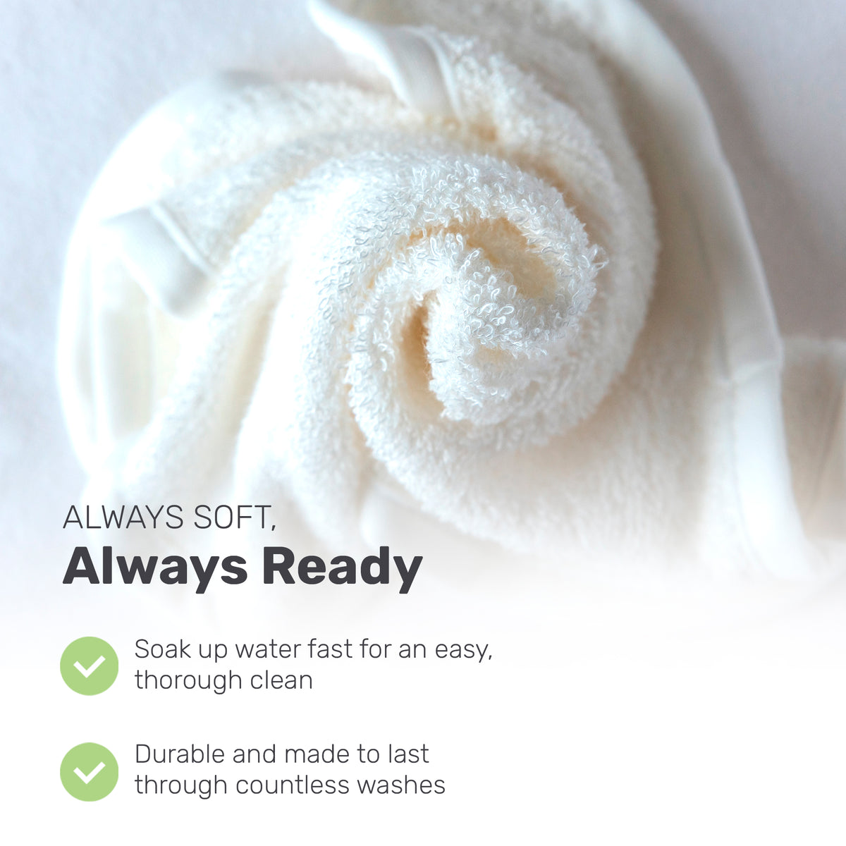 Rolled white Lamb Babies washcloth, close-up