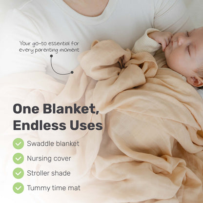 Parent holding a baby in a Lamb Babies muslin blanket, shown as swaddle, nursing cover and stroller cover