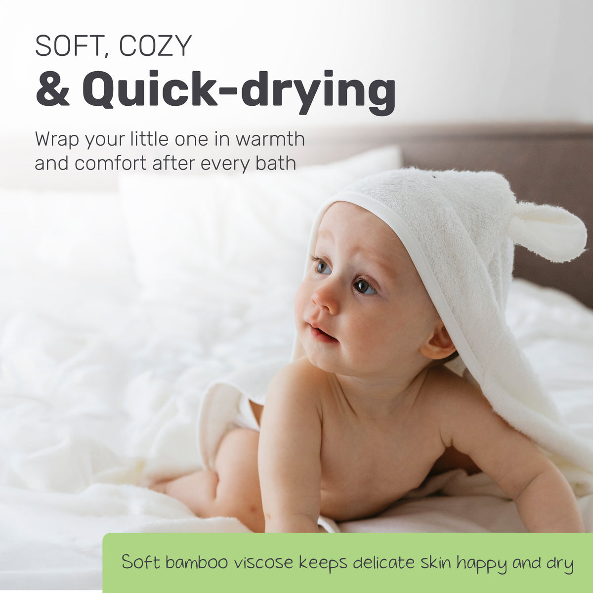 Baby in a Lamb Babies hooded towel after bath time