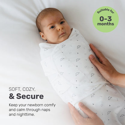 Baby wrapped in a Lamb Babies Snug Swaddle Wrap, for ages 0-3 months