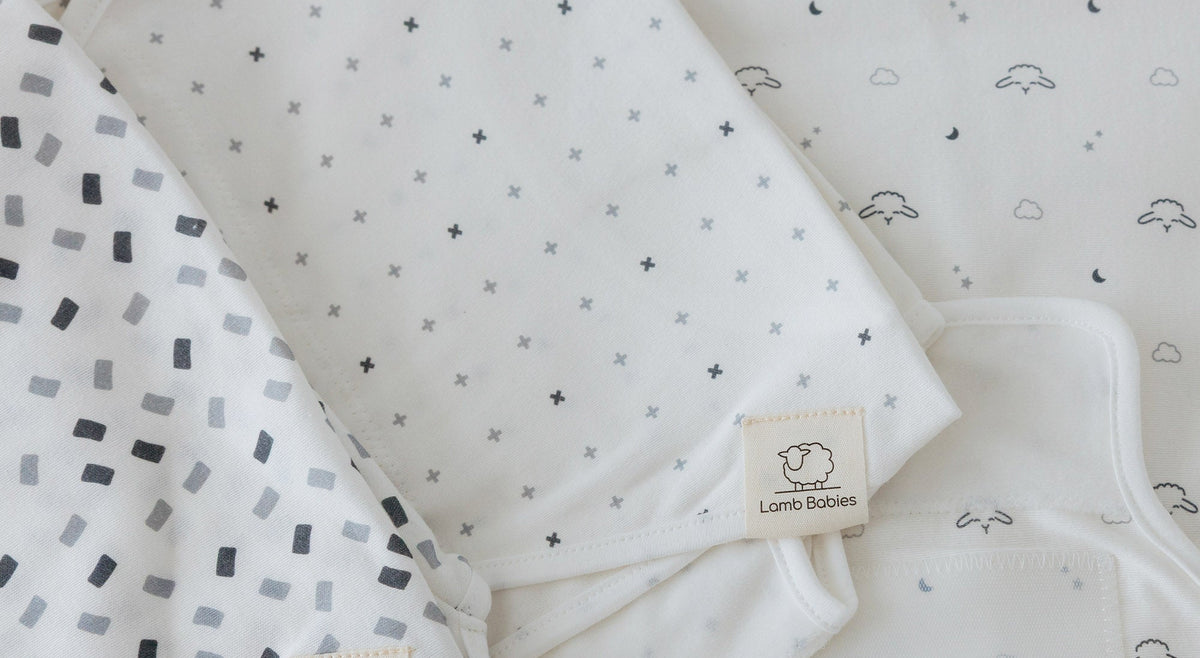Patterned Lamb Babies Snug Swaddle Wrap, close-up